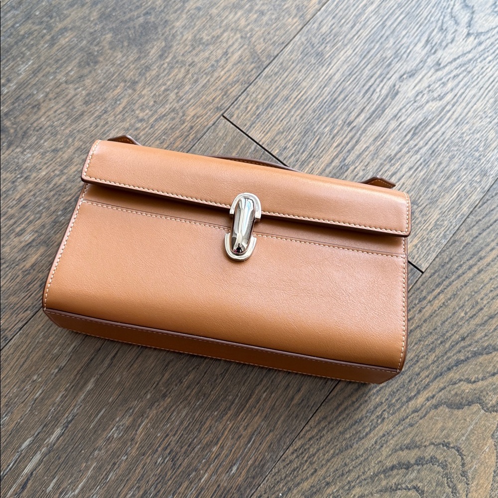 SAVETTE
Symmetry Pochette Leather Top-Handle Bag Brown